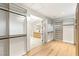 Large walk-in closet with custom shelving and drawers leading into the Primary bathroom at 2316 Prometheus Ct, Henderson, NV 89074
