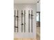 This contemporary wine cellar features a textured wall and a custom wine rack storage system at 2316 Prometheus Ct, Henderson, NV 89074