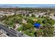 Vibrant aerial view of park offering mature trees, baseball field, and playground equipment at 2501 Muirfield Ave, Henderson, NV 89074