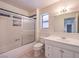 The bathroom is equipped with a shower-tub, a toilet, and vanity, and a medicine cabinet above at 2501 Muirfield Ave, Henderson, NV 89074