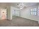 Spacious bedroom features mirrored closet, neutral carpeting, and bright window at 2501 Muirfield Ave, Henderson, NV 89074