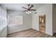Cozy living space with new flooring, neutral walls, and large windows offering ample natural light at 2501 Muirfield Ave, Henderson, NV 89074