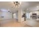 Open floor plan with combined living and kitchen areas, perfect for entertaining and everyday living at 2501 Muirfield Ave, Henderson, NV 89074