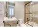 Well-appointed bathroom featuring a tub-shower combo, modern vanity, and stylish tile work at 253 Malpaso St, Las Vegas, NV 89138