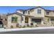 Charming two-story home boasting a well-manicured front yard, tile roof, and an attached two-car garage at 253 Malpaso St, Las Vegas, NV 89138