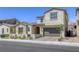 Inviting home showcasing a well-maintained yard, a paver driveway, and a two-car garage at 253 Malpaso St, Las Vegas, NV 89138
