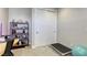 Bright home office featuring double door closet and stylish shelving unit at 253 Malpaso St, Las Vegas, NV 89138