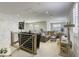 Open living room with second story view, sectional sofa, and a pet tower at 253 Malpaso St, Las Vegas, NV 89138