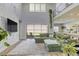 Spacious living room showcasing a modern sofa, tall ceilings, and seamless transition to the outdoor area at 253 Malpaso St, Las Vegas, NV 89138
