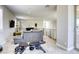 Upstairs entertainment area featuring a large sectional sofa and workout equipment at 253 Malpaso St, Las Vegas, NV 89138