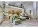 Open-concept living room boasting a view of the modern kitchen and second-floor loft space at 253 Malpaso St, Las Vegas, NV 89138