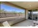 Spacious covered patio featuring a mountain view and outdoor access to the backyard at 253 Malpaso St, Las Vegas, NV 89138