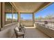 Inviting covered patio with comfortable seating and a view of the surrounding landscape at 253 Malpaso St, Las Vegas, NV 89138