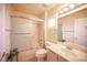 Well-lit bathroom with a shower and vanity at 2737 Tumble Brook Dr, Las Vegas, NV 89134