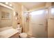 Bathroom featuring shower with glass door, toilet, and vanity at 2737 Tumble Brook Dr, Las Vegas, NV 89134
