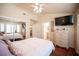 Spacious bedroom with hardwood floors and a view of the bathroom at 2737 Tumble Brook Dr, Las Vegas, NV 89134