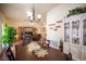 An open layout integrates the dining room and living area at 2737 Tumble Brook Dr, Las Vegas, NV 89134