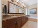 This bathroom features granite countertops and recessed lighting at 3016 High Range Dr, Las Vegas, NV 89134