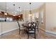 Charming breakfast nook with wood table, pendant lighting, and window views at 3016 High Range Dr, Las Vegas, NV 89134