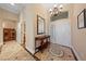 Elegant foyer with marble floors, high ceilings, and a decorative chandelier at 3016 High Range Dr, Las Vegas, NV 89134