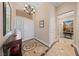 Elegant foyer features decorative flooring, a chandelier, and access to multiple rooms at 3016 High Range Dr, Las Vegas, NV 89134