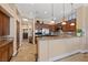 Well-equipped kitchen featuring wooden cabinets, stainless steel appliances, and granite countertops at 3016 High Range Dr, Las Vegas, NV 89134