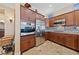 Stylish kitchen with custom cabinetry, stainless steel appliances, and tiled backsplash at 3016 High Range Dr, Las Vegas, NV 89134