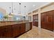 Gourmet kitchen featuring stainless steel appliances and custom cabinets with marble countertops at 3016 High Range Dr, Las Vegas, NV 89134