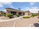 Inviting backyard featuring low-maintenance landscaping, and a cozy patio area perfect for outdoor seating at 3016 High Range Dr, Las Vegas, NV 89134