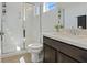 Bright bathroom features a walk-in shower, a modern vanity, and stylish fixtures at 3038 Villanelle Ave, Henderson, NV 89044