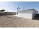 Backyard with gravel and cinder block wall at 3115 Wright Ave, North Las Vegas, NV 89030