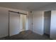 Cozy bedroom featuring new carpet and a barn door at 3115 Wright Ave, North Las Vegas, NV 89030