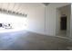Covered carport with painted rafters and entrance to house at 3115 Wright Ave, North Las Vegas, NV 89030