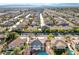 Aerial view of the property with a swimming pool and basketball court in a Primary planned community at 3382 Montessouri, Las Vegas, NV 89117
