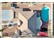 A beautiful bird's eye view showing inground pool, basketball court and desert landscaping at 3382 Montessouri, Las Vegas, NV 89117
