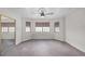 Bedroom featuring neutral carpet, a ceiling fan, and closet with mirrored doors at 3382 Montessouri, Las Vegas, NV 89117