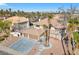 A beautiful home with desert landscaping and a large two-car garage and circular driveway at 3382 Montessouri, Las Vegas, NV 89117