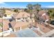 An immaculate home with two-car garage, desert landscaping, and a circular driveway at 3382 Montessouri, Las Vegas, NV 89117