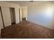 Bedroom boasts a closet, neutral paint, and carpeted floors, ideal for relaxation at 3429 Back Country Dr, North Las Vegas, NV 89031