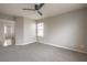 Large bedroom area featuring a ceiling fan, and neutral carpeting at 3731 Prairie Orchid Ave, North Las Vegas, NV 89081