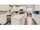 Bright, modern kitchen with a central island, stainless steel appliances, and ample counter space at 3749 Climbing Rose St, Las Vegas, NV 89147