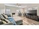 Spacious living room boasts fireplace, breakfast bar, and hardwood flooring at 3749 Climbing Rose St, Las Vegas, NV 89147