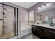 Bathroom features a soaking tub and separate shower at 3760 Candytuft Ridge Ave, North Las Vegas, NV 89081