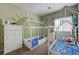 bedroom with two house beds and green walls at 3760 Candytuft Ridge Ave, North Las Vegas, NV 89081