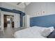Bright bedroom with views to kitchen, large closet, and modern decor at 3760 Candytuft Ridge Ave, North Las Vegas, NV 89081