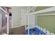 bedroom with two house beds and green walls at 3760 Candytuft Ridge Ave, North Las Vegas, NV 89081