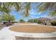 Community park featuring picnic tables, shade structure and playground with ample green space at 3760 Candytuft Ridge Ave, North Las Vegas, NV 89081