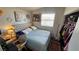 Cozy bedroom featuring a comfortable bed, closet, and decorative wall art at 3871 Sir Bret Ct, Las Vegas, NV 89104