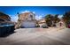 Charming home featuring a two-car garage and low-maintenance landscaping at 3871 Sir Bret Ct, Las Vegas, NV 89104