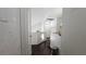 Upstairs hallway with fresh paint, new carpet, and multiple bedrooms at 3871 Sir Bret Ct, Las Vegas, NV 89104